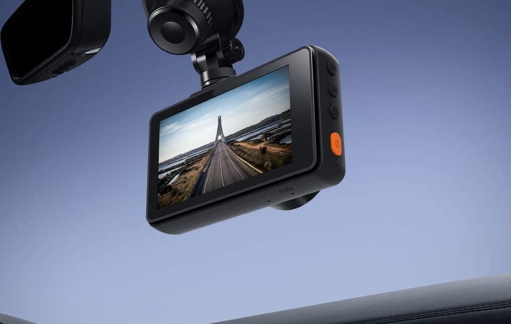 the dash cam mounted on a window