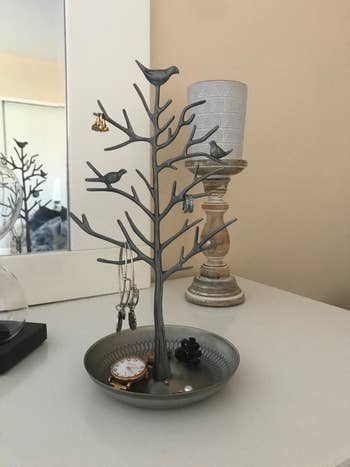 Reviewer photo of tree-shaped jewelry stand in silver