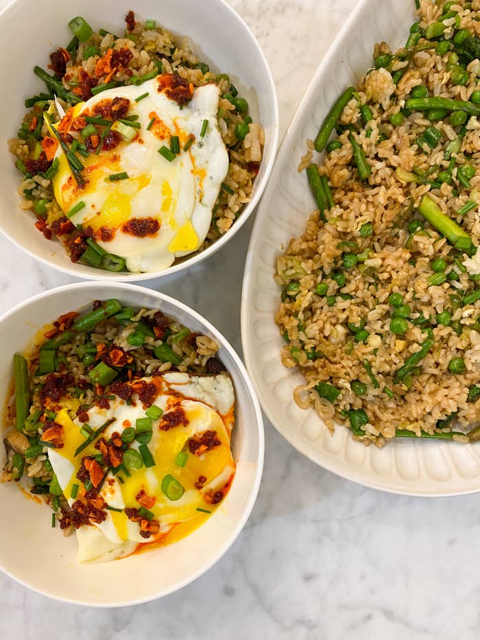 Spring vegetable fried rice topped with an egg.