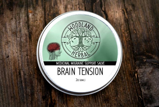 Brain tension salve in a metal container 