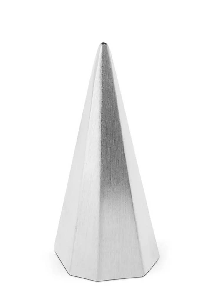a silver metal cone ring holder