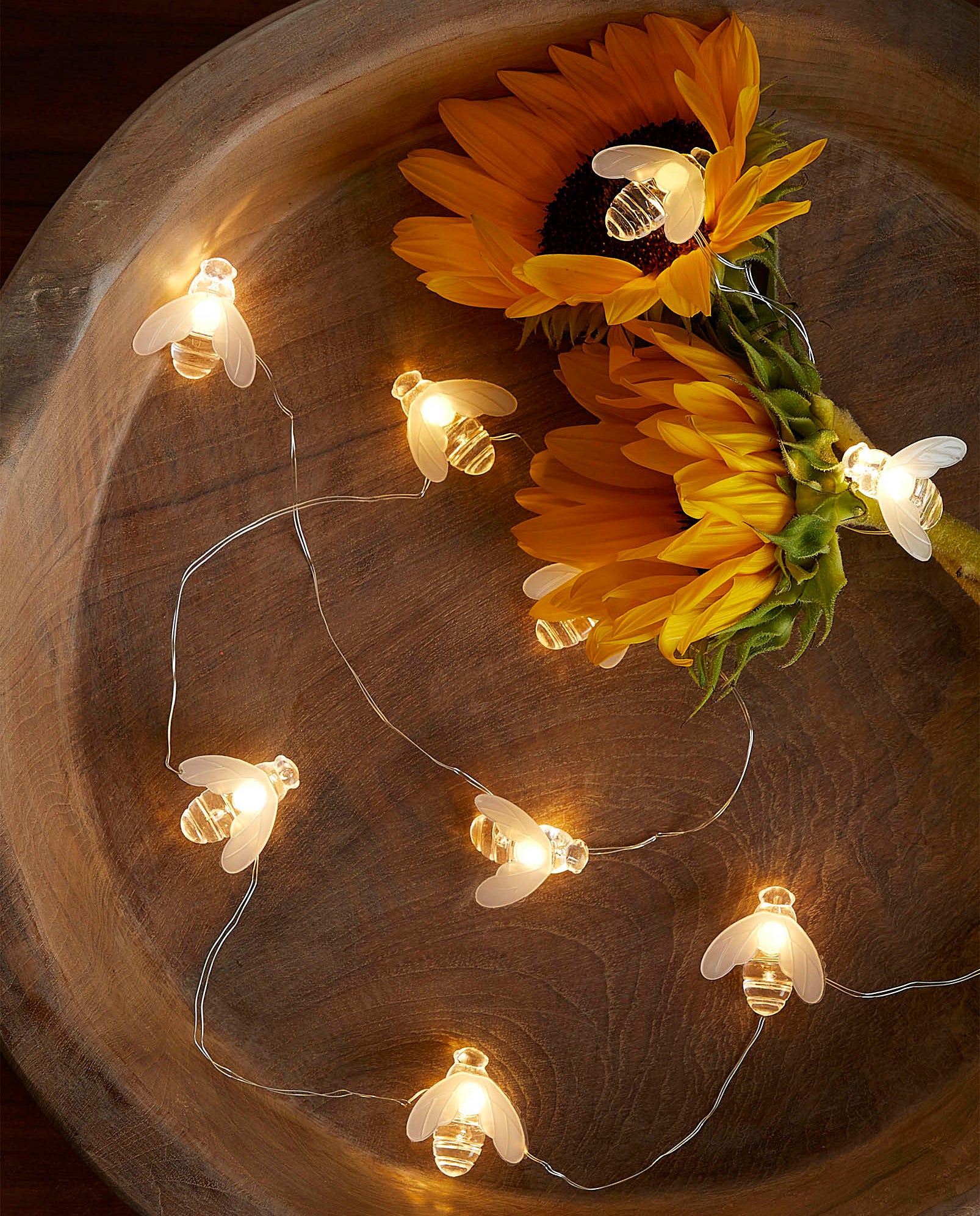A string of bee-shaped fairy lights