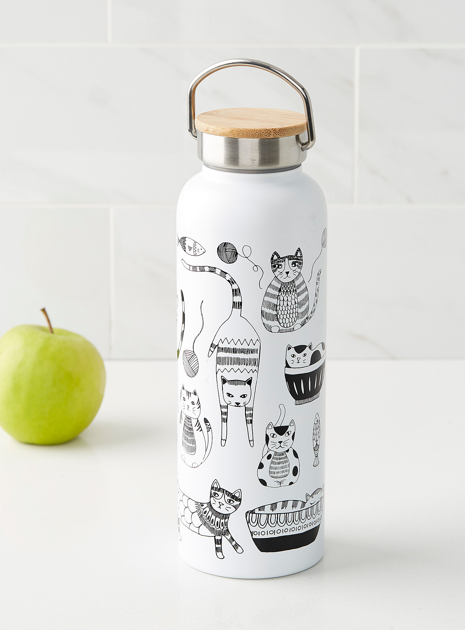 A stainless steel bottle with a cute cat pattern designed on it