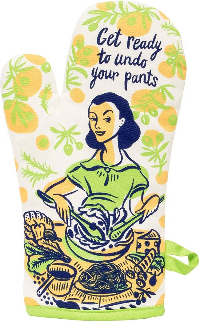 oven mitt with an illustration of a person cooking and the text 