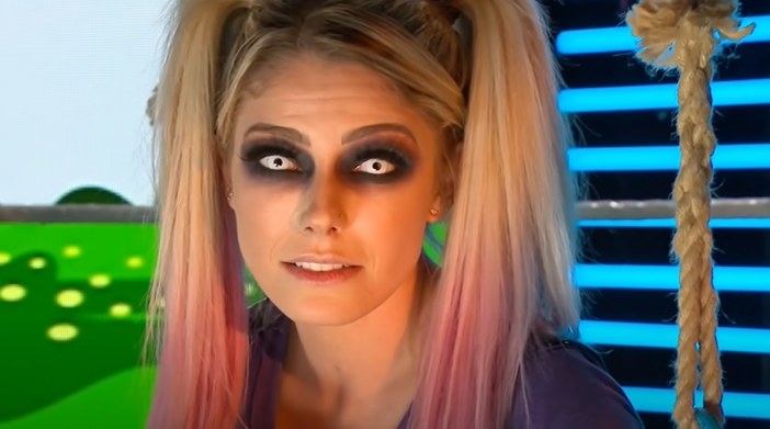 Alexa Bliss with white contacts on a swing