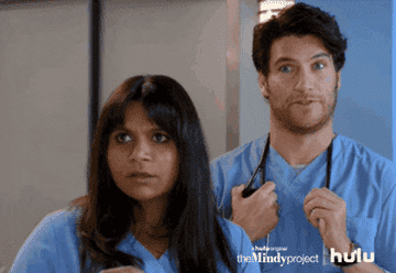 Mindy and Peter looking shocked 