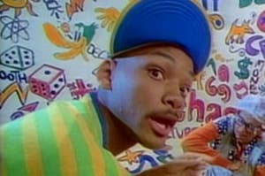will smith as fresh prince with his mouth open, wearing a backward hat