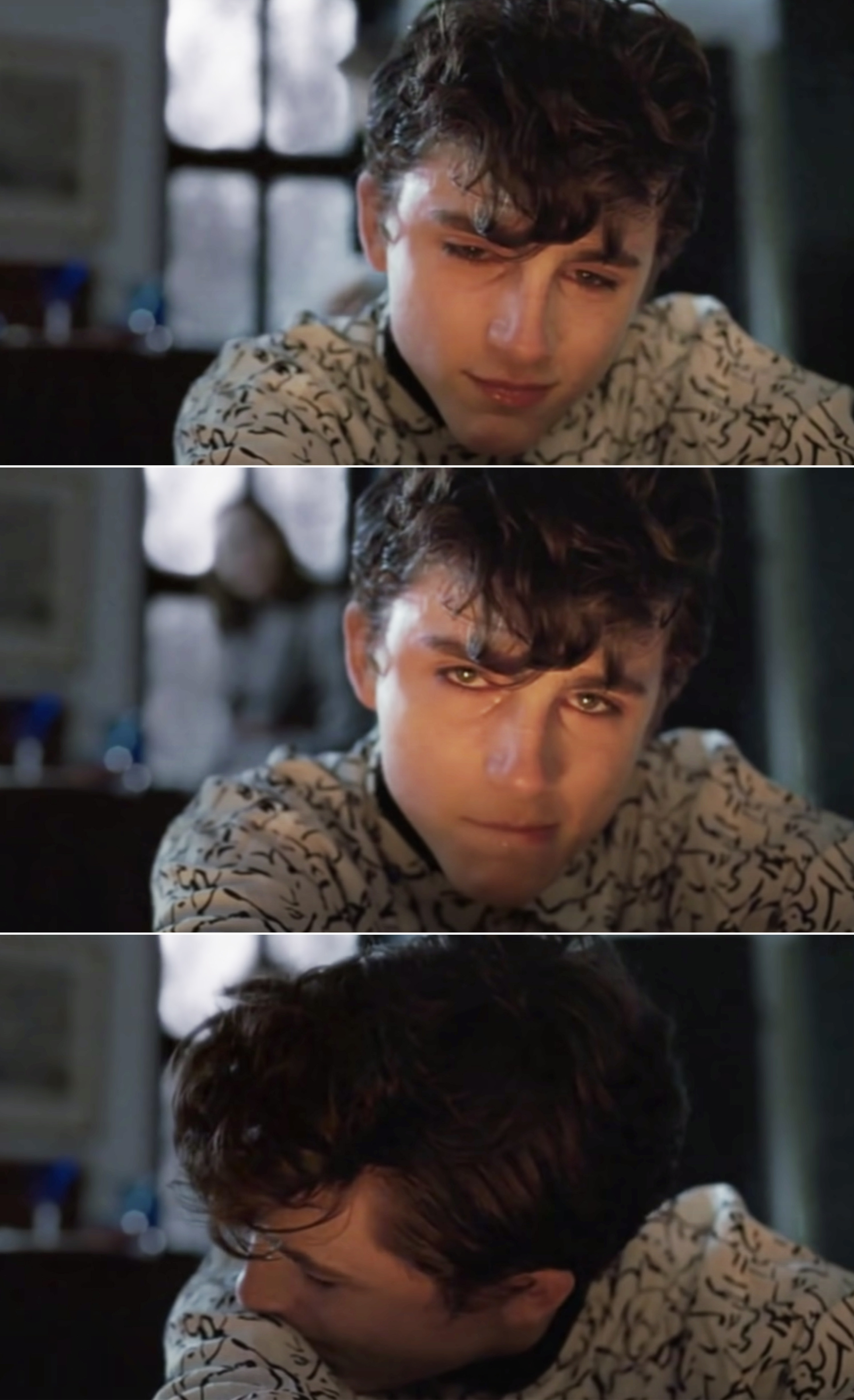 Elio crying and looking into the camera