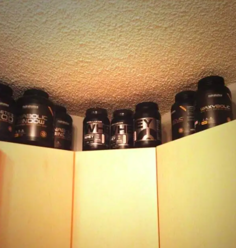 bottles of protein on cabinets