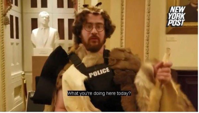 Mostofsky wears furs and a police vest