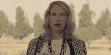 a gif of actress Leslie Grossman in &quot;American Horror Story&quot; rolling her eyes and saying &quot;There&#x27;s gluten in here&quot;