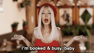 gif of someone from love and hip hop saying, &quot;I&#x27;m booked and busy, baby&quot; 