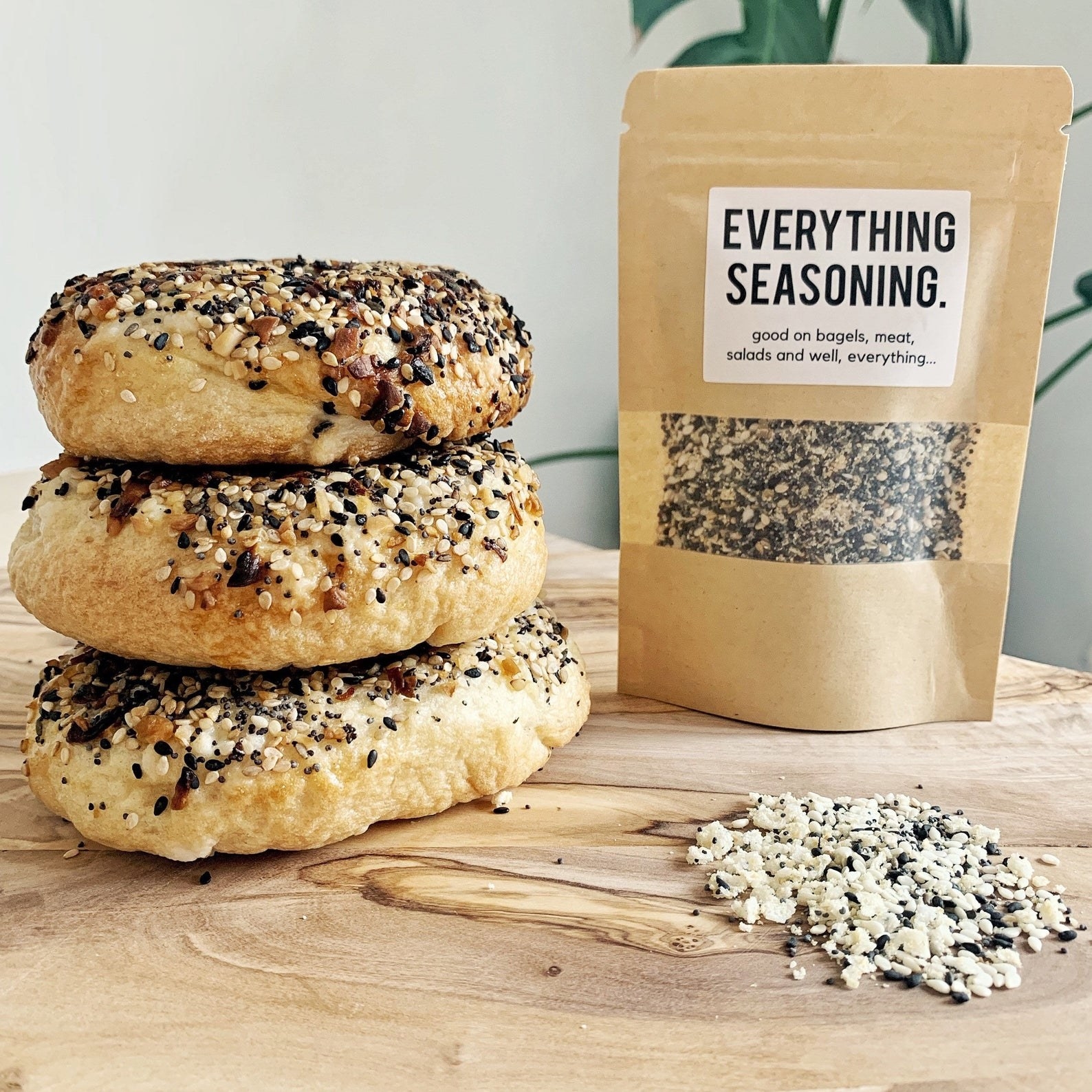 The seasoning package next to a stack of bagels