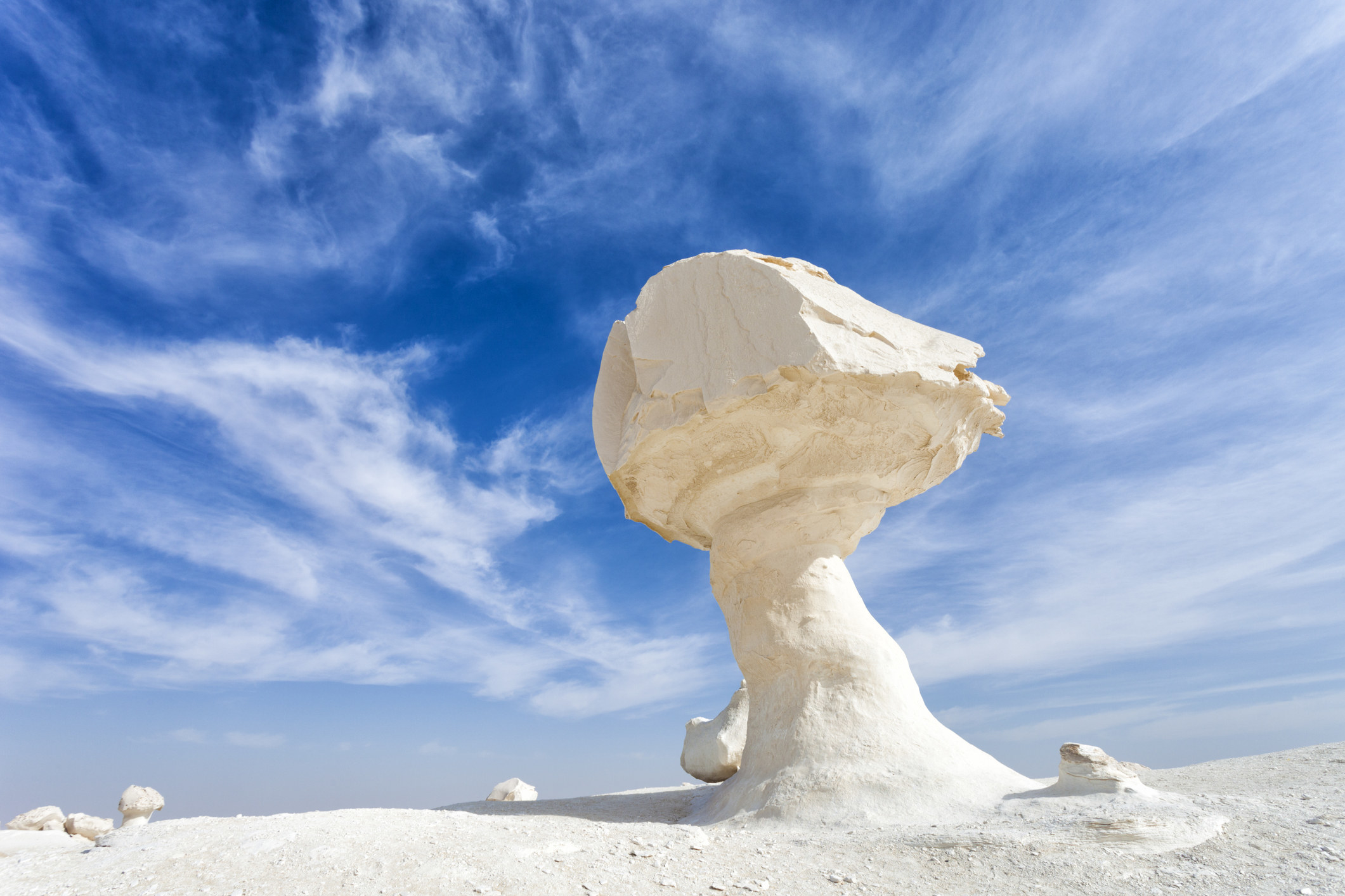 White mushroom-like stone outcropping in the desert