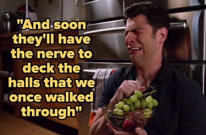 &quot;And soon they&#x27;ll have the nerve to deck the halls that we once walked through&quot; written over Schmidt from &quot;New Girl&quot; crying while eating grapes