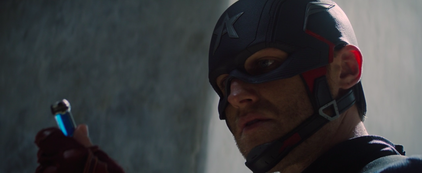 Fake Captain America holding a vial of the Super Soldier serum