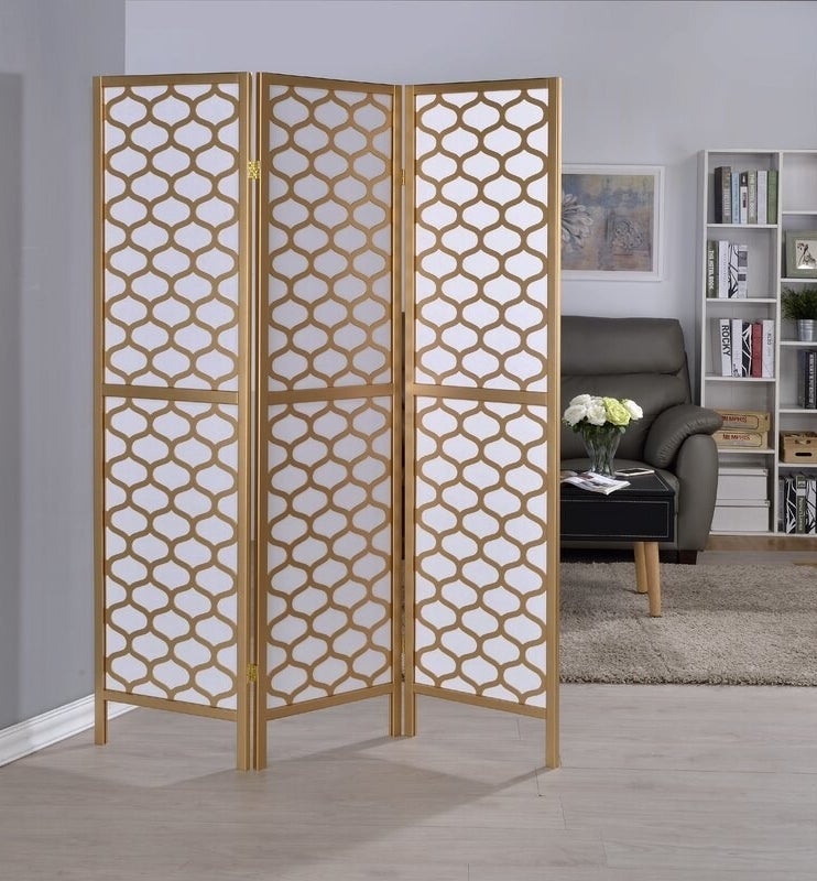 The gold and white room divider
