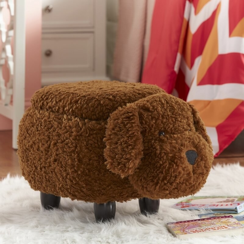 The brown fuzzy dog-shaped ottoman