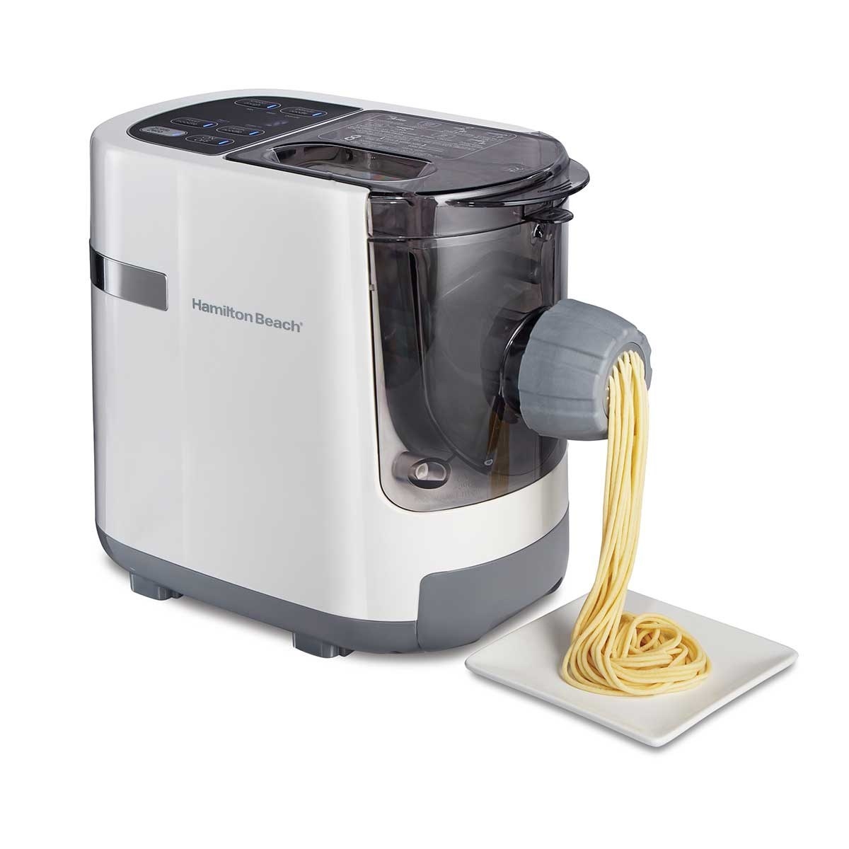 the grey machine with pasta extruding
