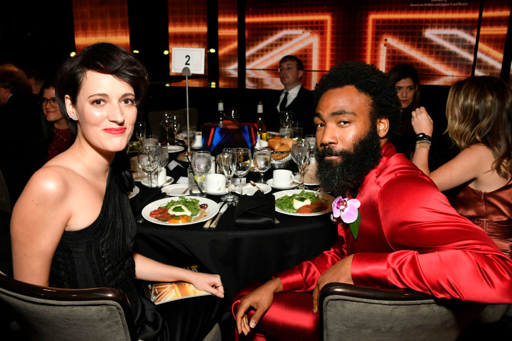 Phoebe and Donald sitting next to each other at an awards show