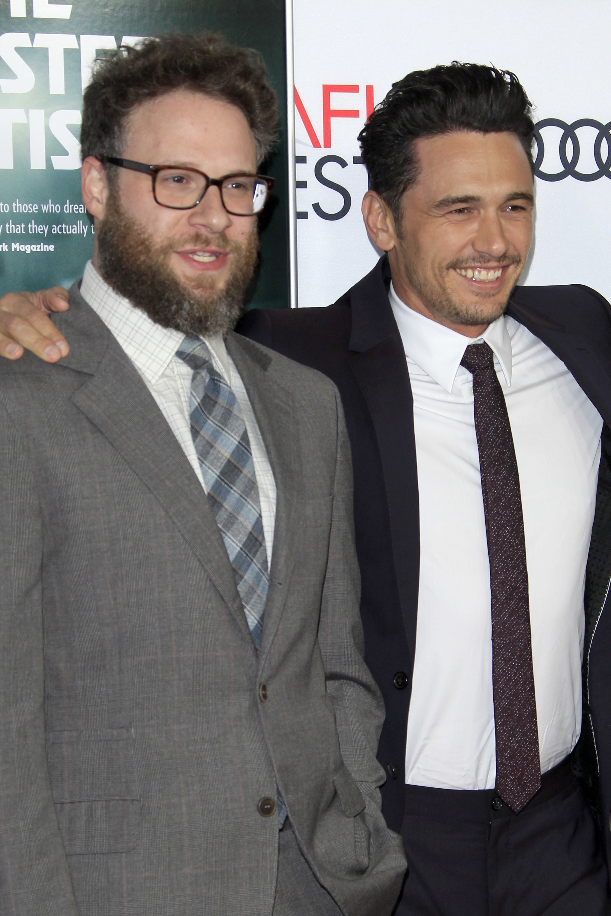 Seth and James posing on a red carpet together