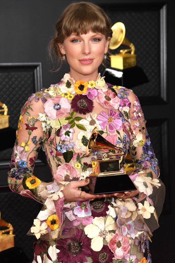 Taylor wearing a flowery dress at the Grammys