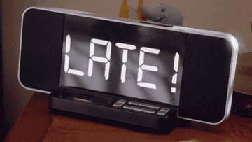 Alarm clock reading &quot;Late!&quot;