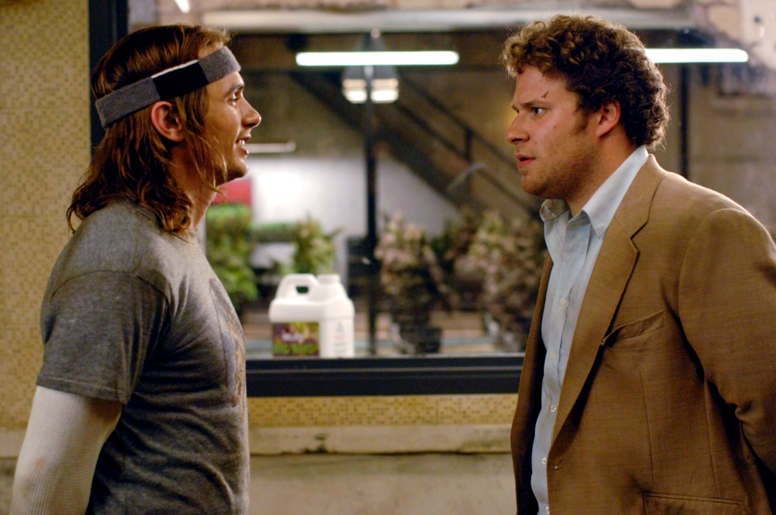 Franco and Rogen look at each other in Pineapple Express