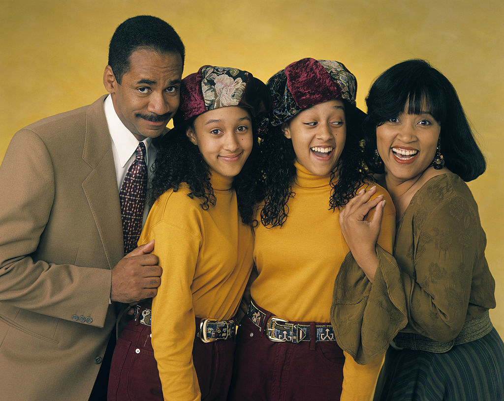 Tim Reid, Tamera Mowry, Tia Mowry, and Jackée Harry pose for &quot;Sister, Sister&quot; portrait