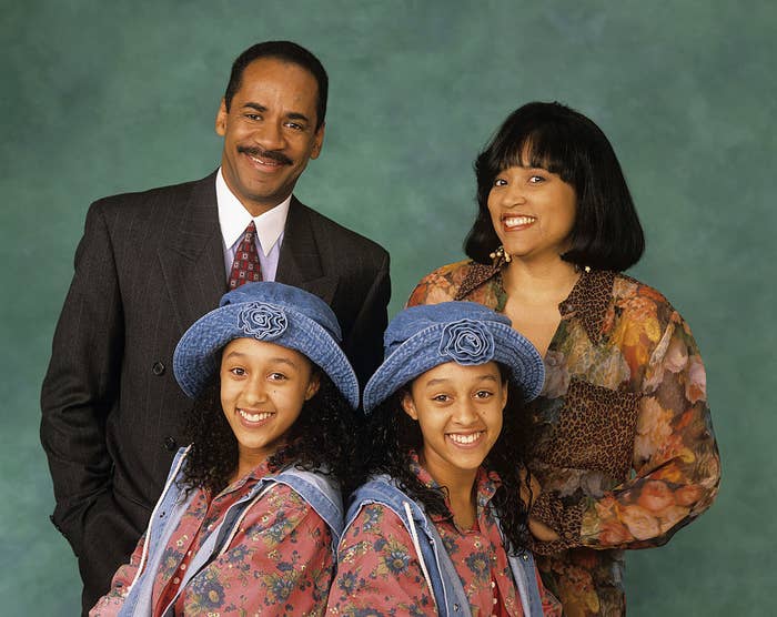 Tim Reid, Tamera Mowry, Tia Mowry, and Jackée Harry pose for "Sister, Sister" portrait