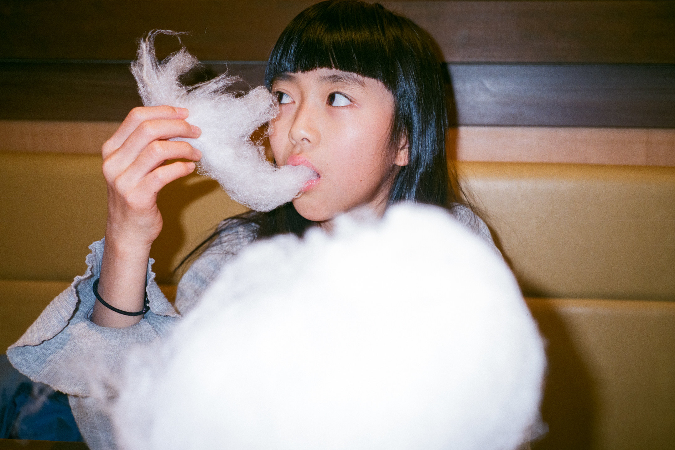 The photographer&#x27;s daughter eating cotton candy