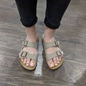 Reviewer wearing cork footbed sandals