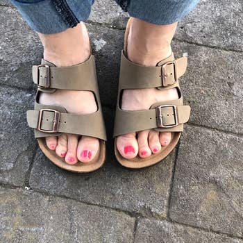 Reviewer wearing cork footbed sandals