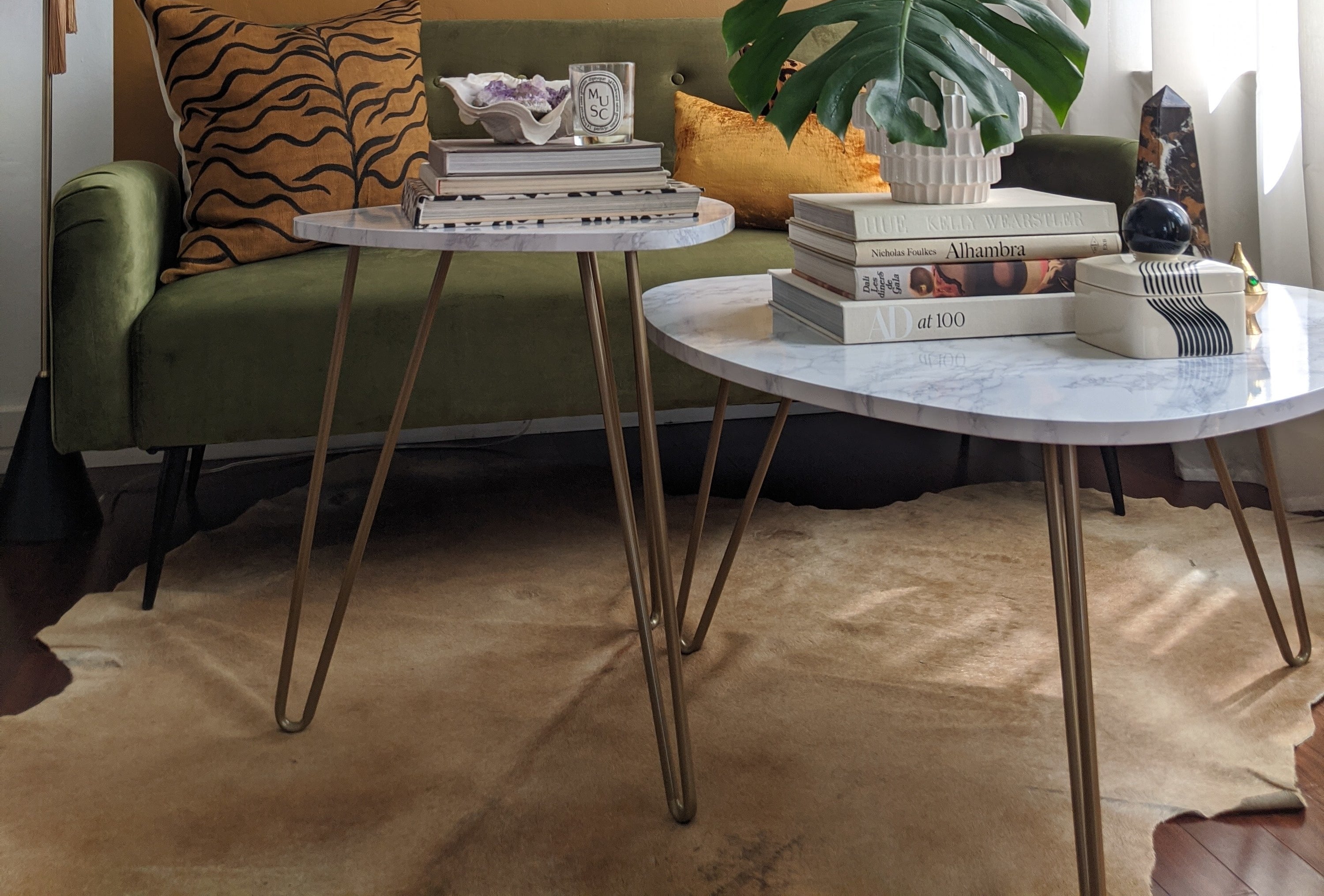 two nesting tables styled as a coffee table