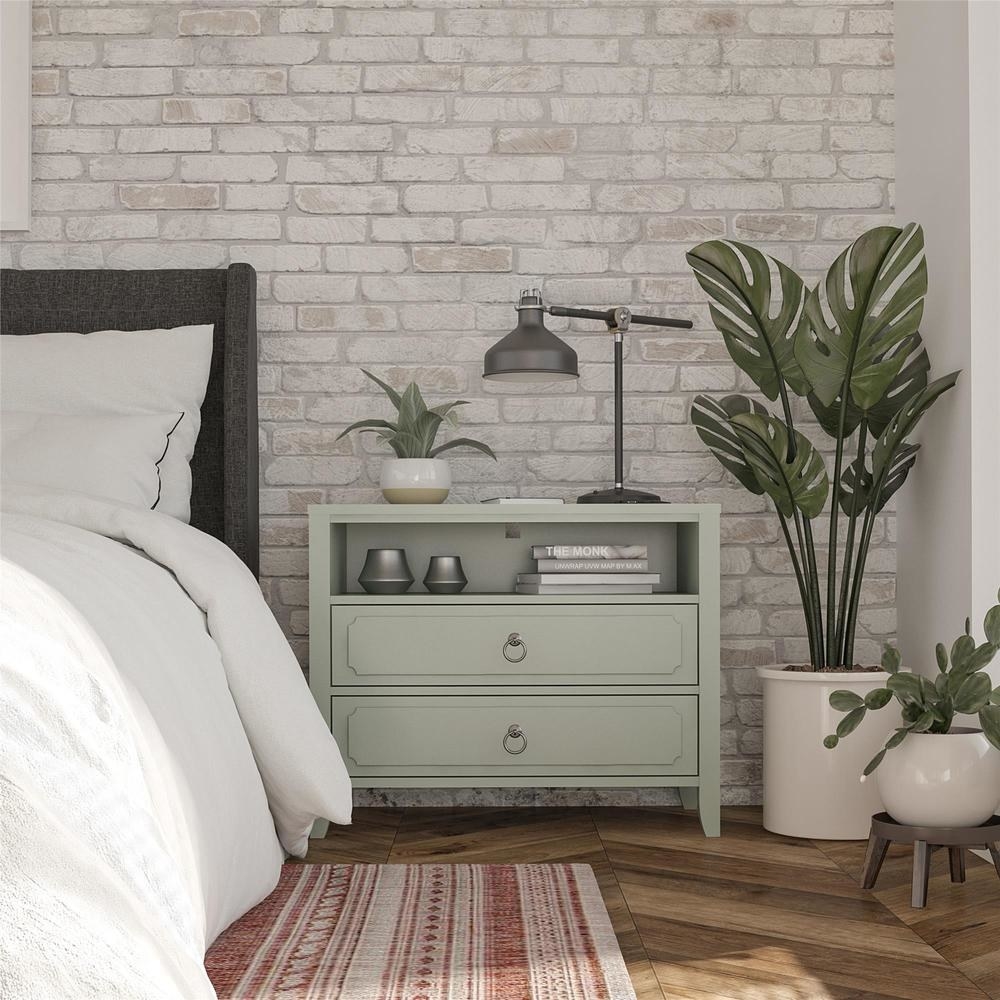 nightstand in a mint green with two drawers and a shelf 