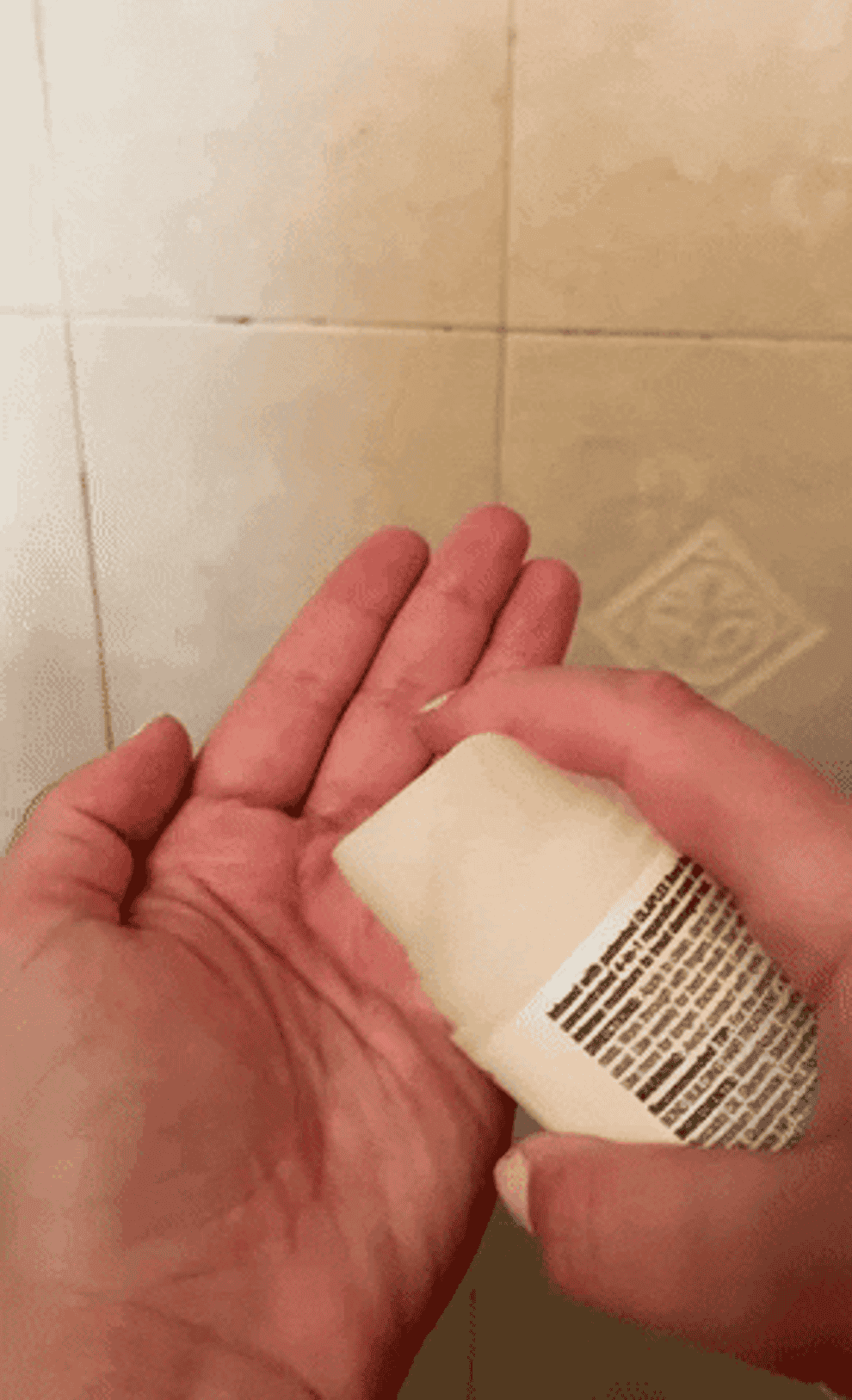 gif of the writer pumping the product into their hand to show it&#x27;s creamy texture 
