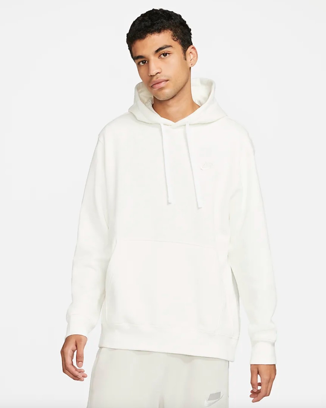 The Nike sportwear fleece in white being worn by a model
