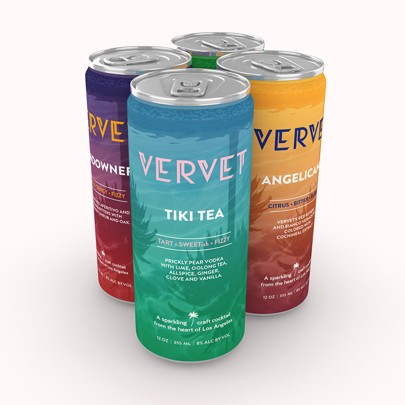 four cans of cocktails with tropical colors