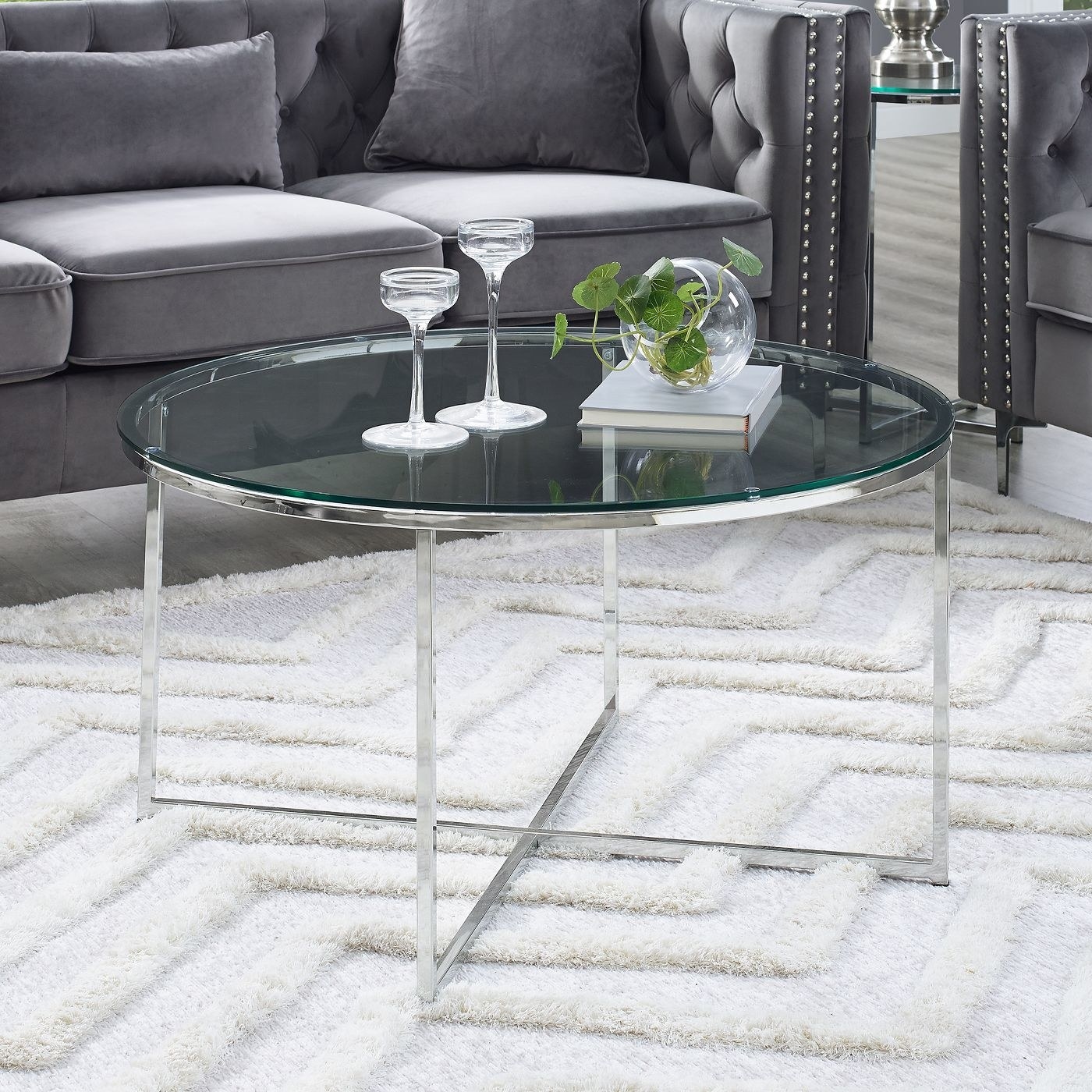 A round glass chrome coffee table