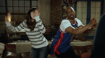 GIF from New Girl of Jess and Coach dancing