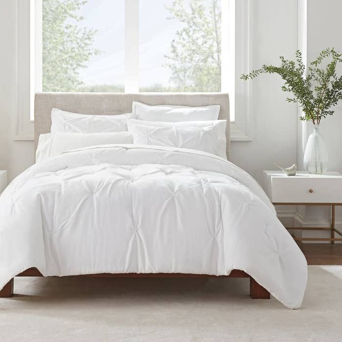 White comforter on bed