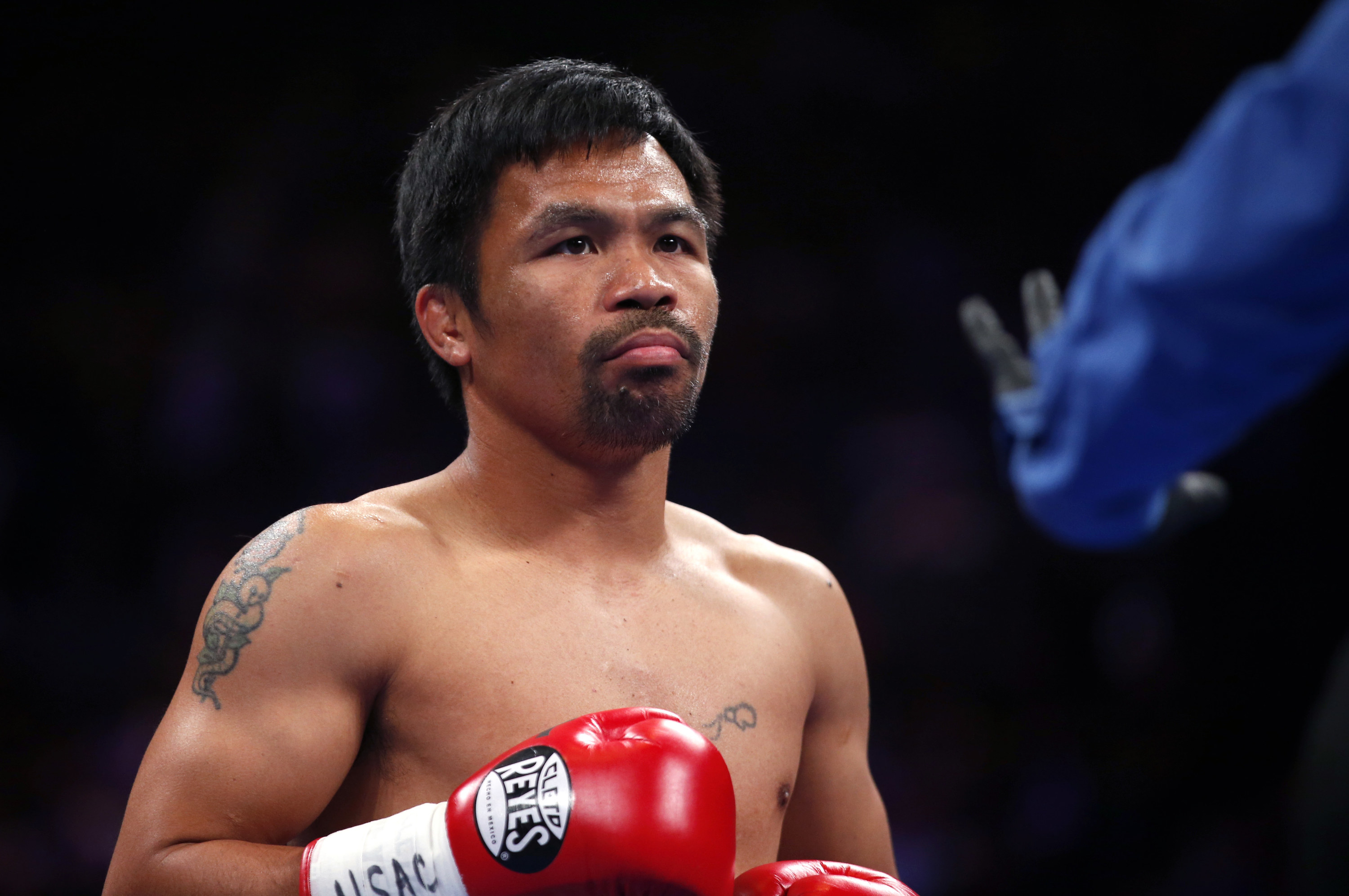 Manny Pacquiao wearing boxing gloves