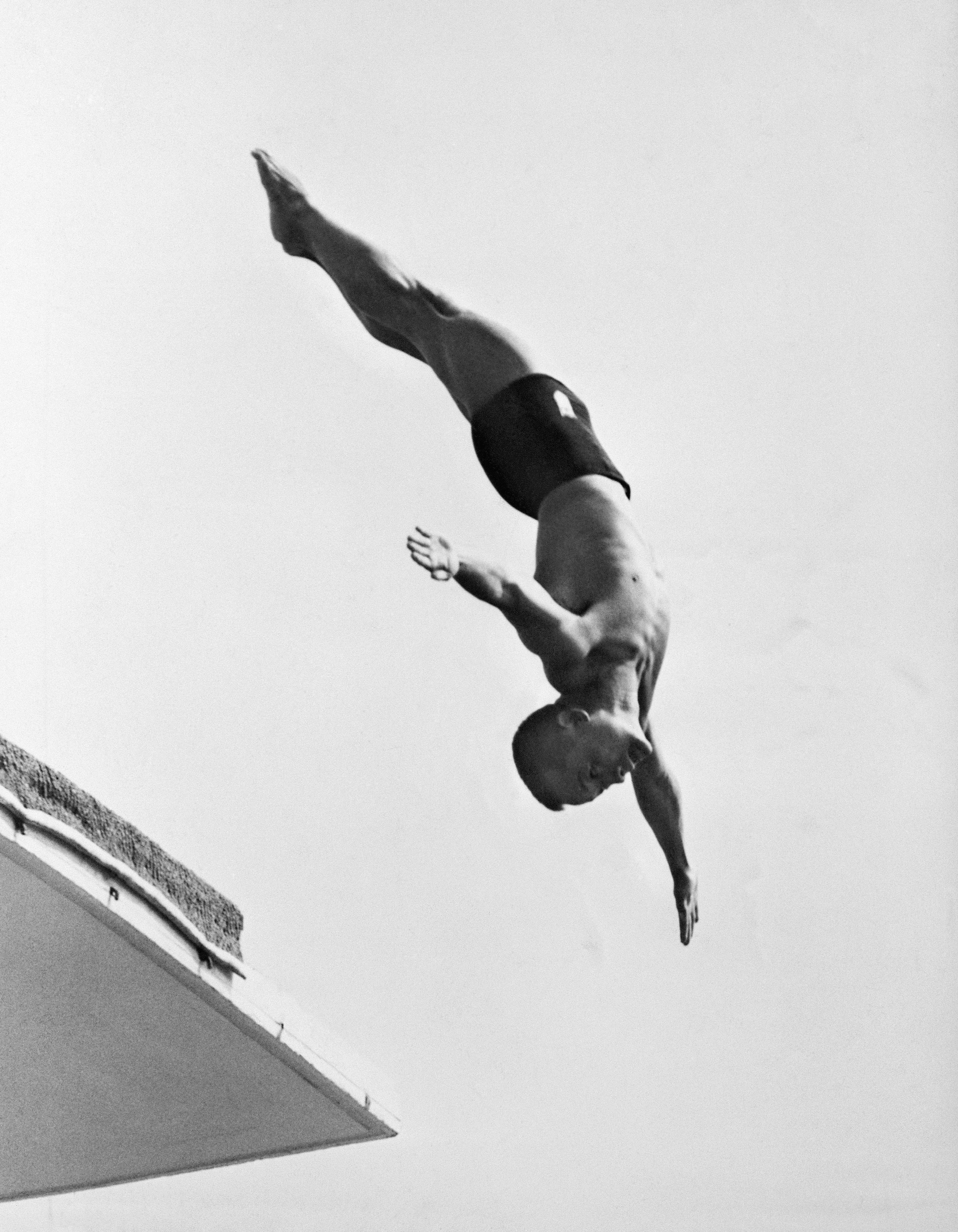 Sammy Lee flipping into a pool