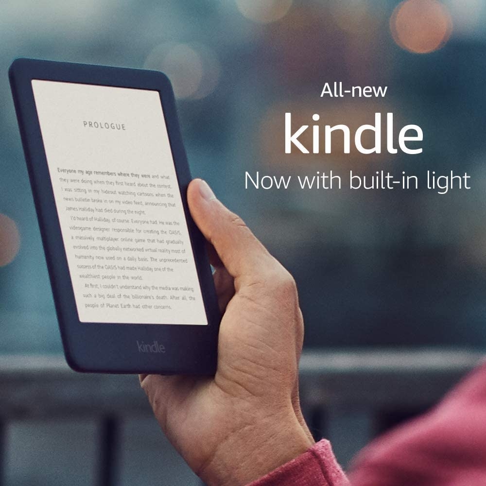 A person reading on a Kindle 