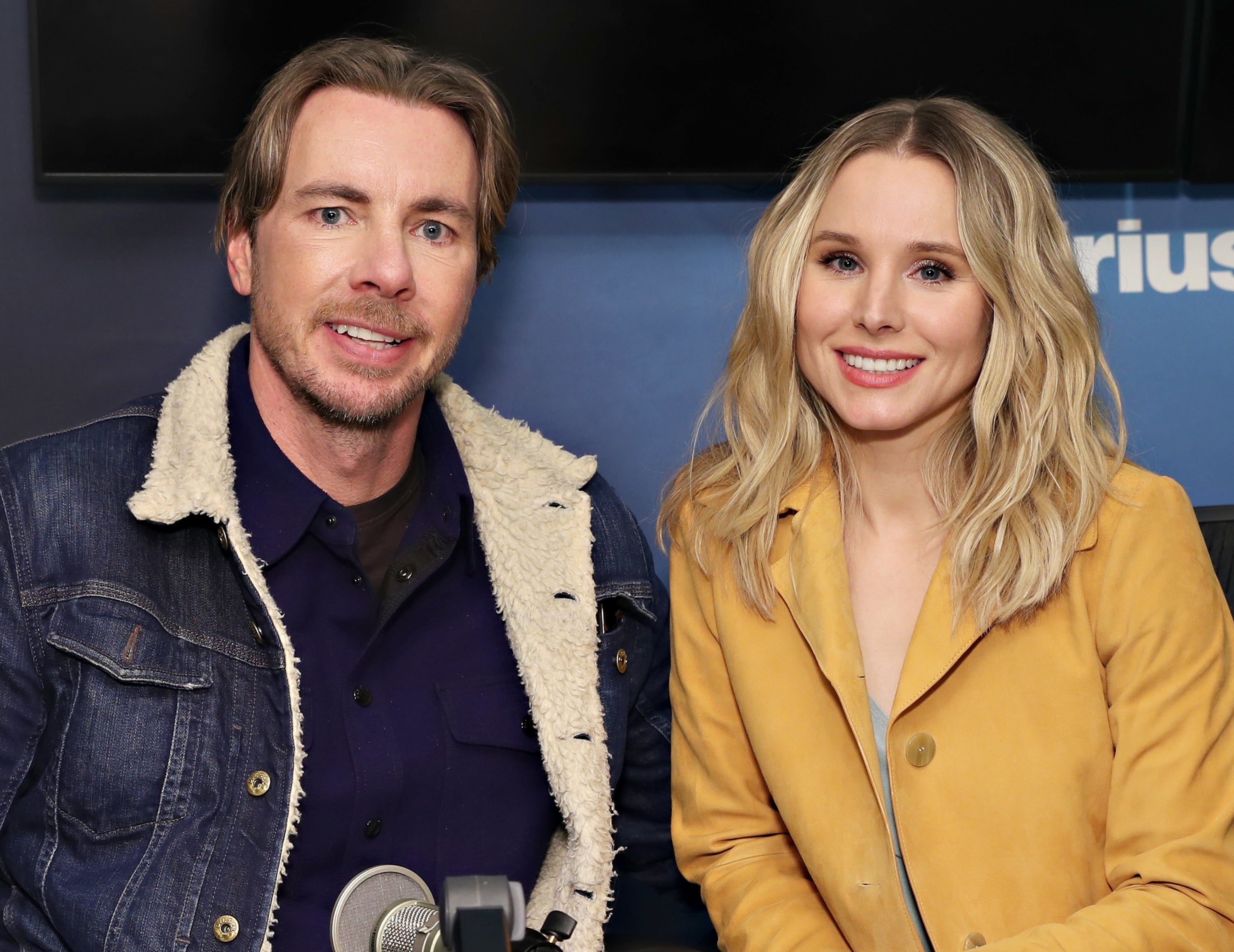 Dax and Kristen smile during a radio interview