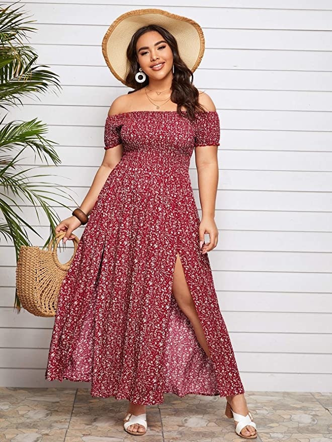 plus size model in off the shoulder floral dress with two front slits