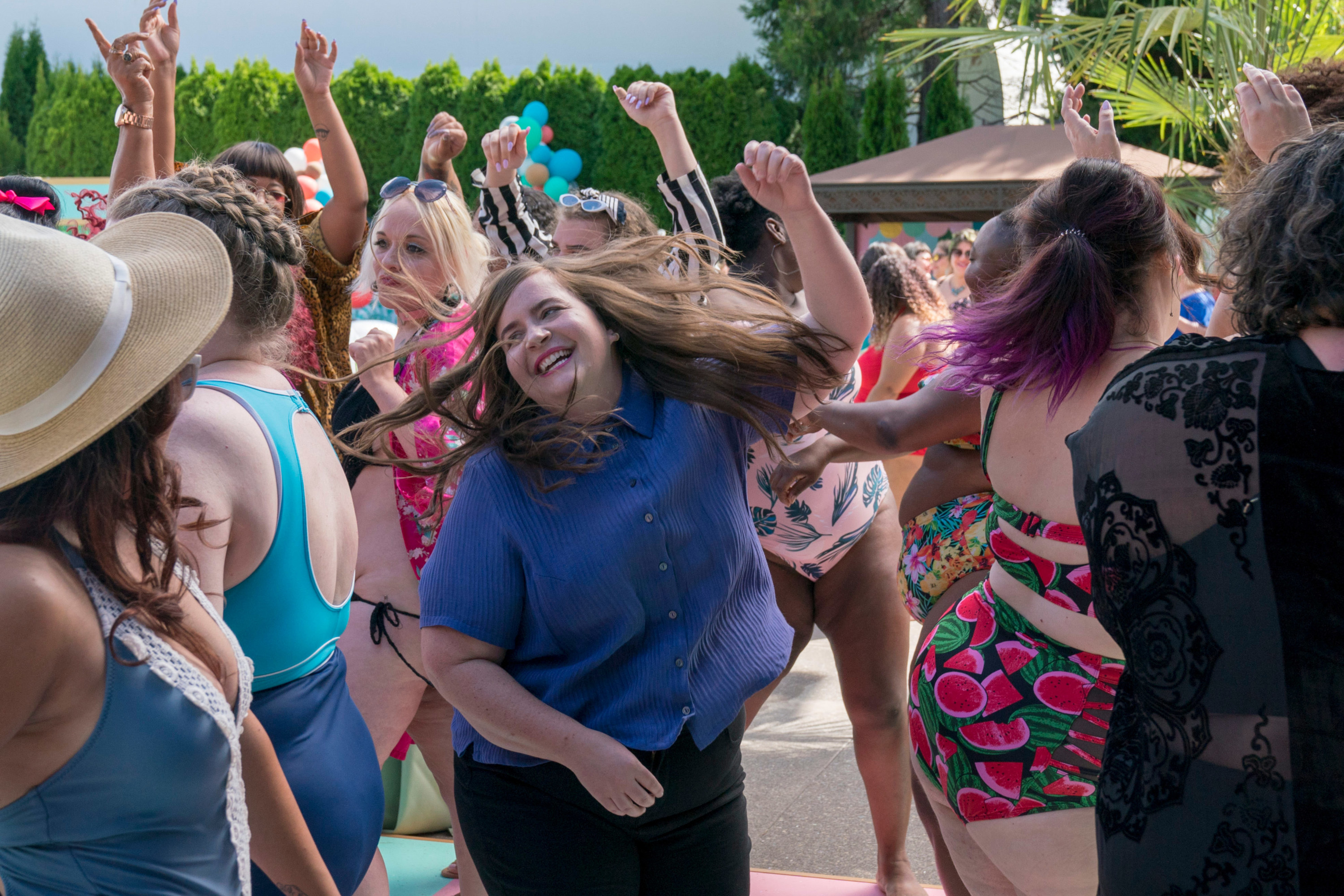 Annie dances at the pool party