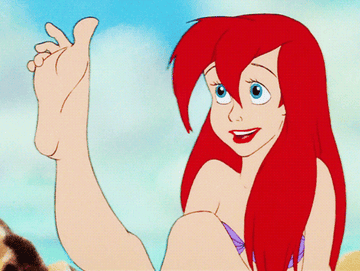 Gif of Ariel in &quot;The Little Mermaid&quot; admiring her feet