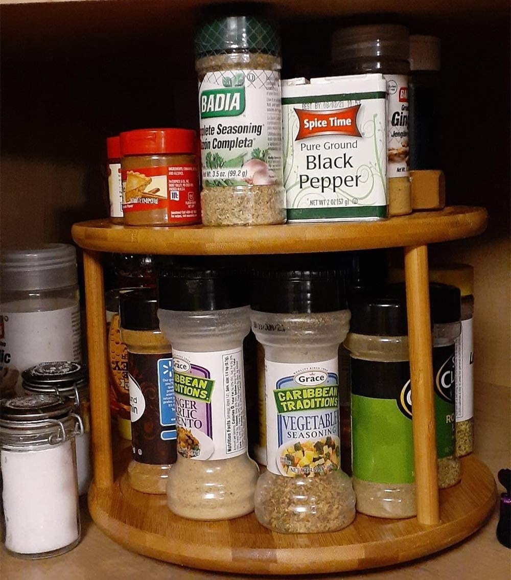 Several bottles and jars of spices on the turntuable