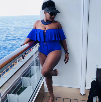 reviewer wearing blue bathing suit 